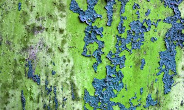 Vintage texture with old cracked paint on rusted metal surface