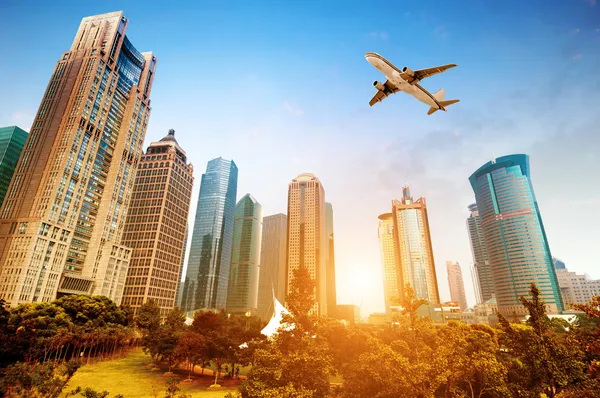Skyscrapers and airplanes — Stock Photo, Image