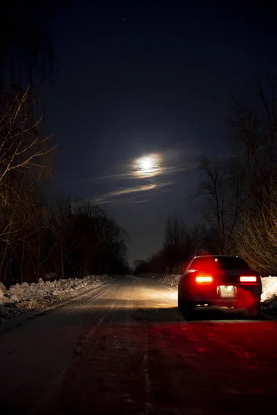 Car Night Snowy Road Light Moon — Stock Photo, Image