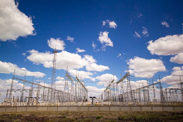 large electrical substation in the desert against the blue sky