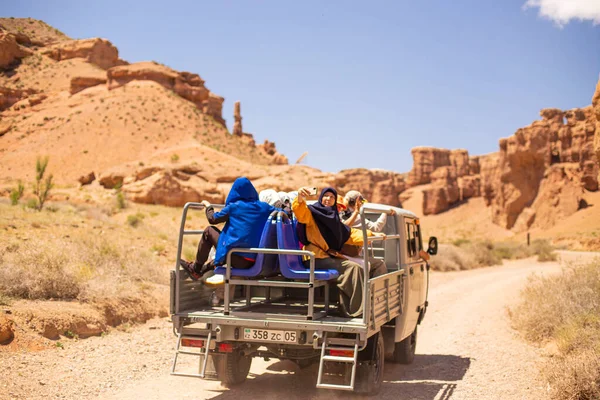 July 6, 2022, kazakhstan, charyn canyon. off-road taxi 4x4 bringing people from the river valley to the plateau