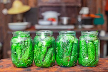 grandmother preparing stocks of pickles to avoid hunger, the background is blurred