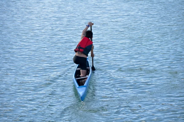 Young athlete in a canoe — Stock Photo, Image