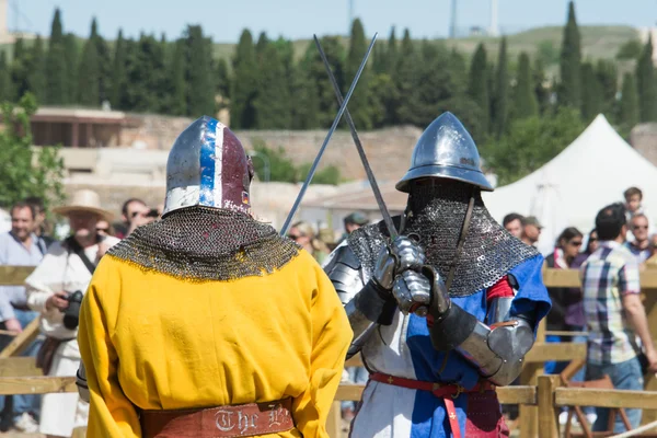 Fighters on the World Championship of Medieval Combat on May 2, 2014 in Belmonte, Cuenca, Spain. This championship is celebrating in the Belmonte castle from May 1 to May 4. — Stock Photo, Image