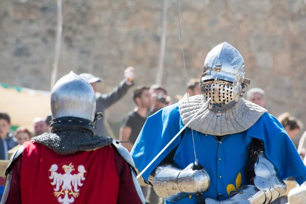 Fighters on the World Championship of Medieval Combat on May 2, 2014 in Belmonte, Cuenca, Spain. This championship is celebrating in the Belmonte castle from May 1 to May 4. — Stock Photo, Image