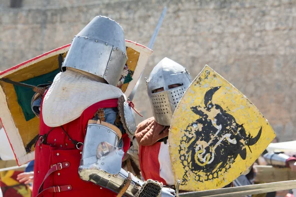 Fighters on the World Championship of Medieval Combat on May 2, 2014 in Belmonte, Cuenca, Spain. This championship is celebrating in the Belmonte castle from May 1 to May 4. — Stock Photo, Image