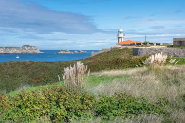 Lighthouse of Punta del Torco de Afuera in Suances, Cantabria, Spain clipart