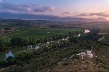 Landscape with Ebro river at sunrise, El Cortijo of Logroo, La Rioja in Spain