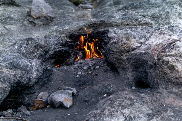 constantly burning fire at the place of a natural gas emission on Mount Chimaera (Yanartas) in Turkey