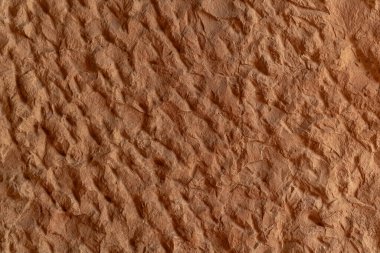 texture of a natural roughly cut stone of some ancient building