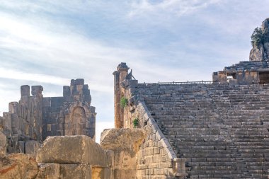 sunlit ruins of antique amphitheater in Myra (now Demre, Turkey) 