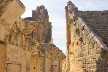sunlit ruins of antique amphitheater in Myra (now Demre, Turkey) 