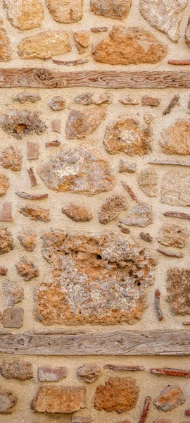 Tło Tekstura Szorstki Mur Dzikiego Kamienia Zaprawy Drewnianej Ramie — Zdjęcie stockowe