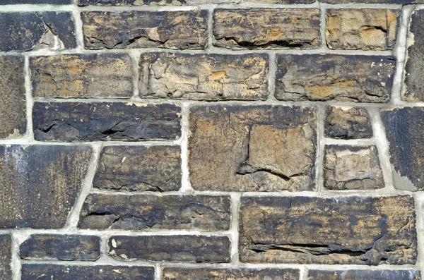 Stary solidny kamienny mur — Zdjęcie stockowe