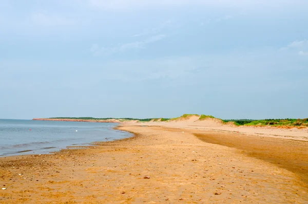 Red sand beach — Stock Photo, Image