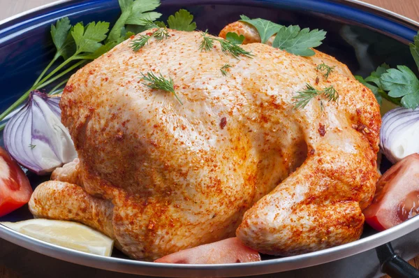 Raw chicken in pot — Stock Photo, Image