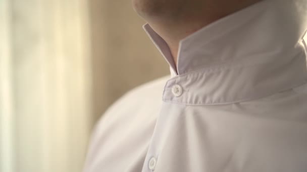 Men wear a beautiful tie - bowtie — Stock video