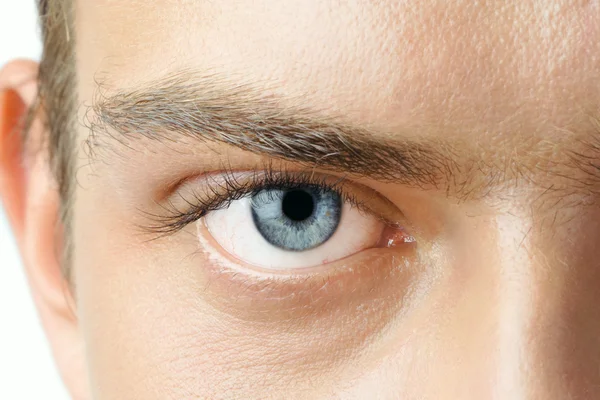 Macro shot of man's blue eye with visible blood vessels — Stock Photo, Image