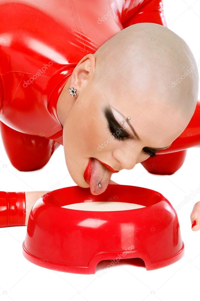 Woman licking milk