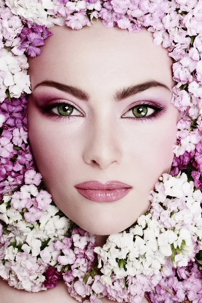 Girl in flowers — Stock Photo, Image