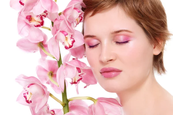 Girl with orchid — Stock Photo, Image