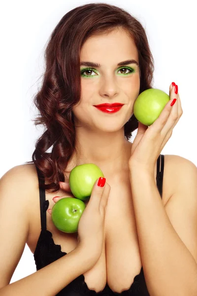Девушка с зелеными яблоками — стоковое фото