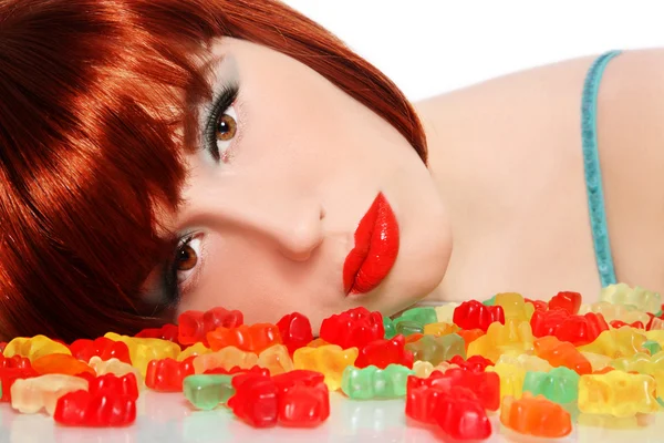 Girl with candies — Stock Photo, Image