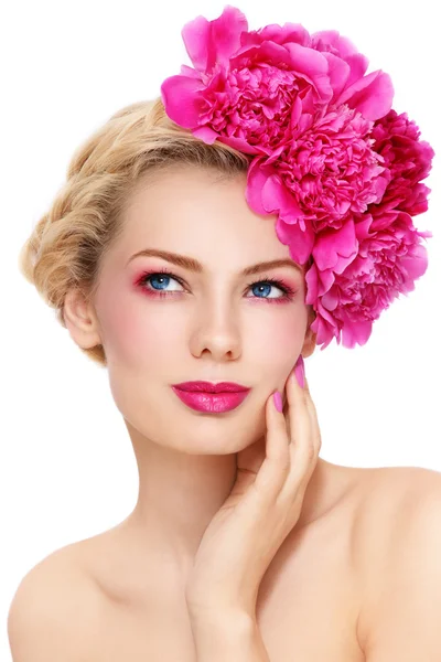 Girl with peonies Stock Image