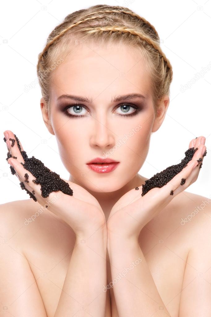 Woman with black caviar