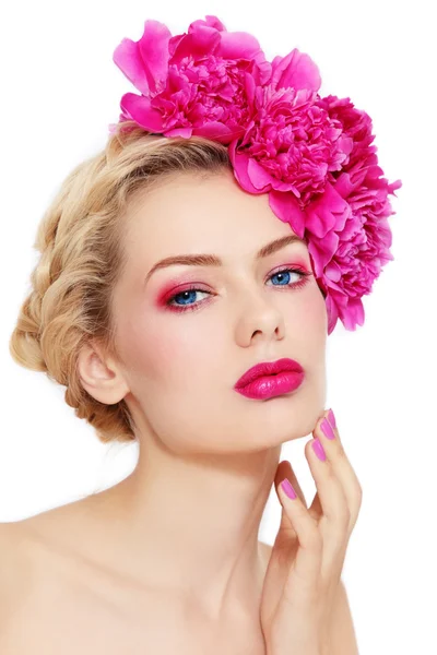 Girl with peonies Stock Image