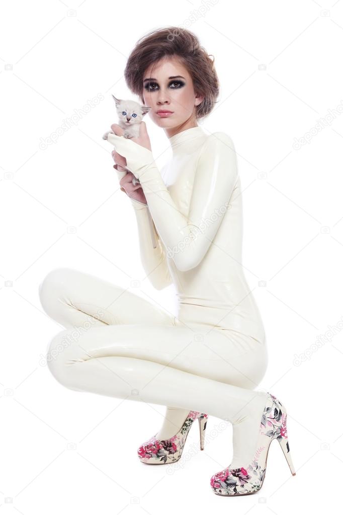 Model in latex catsuit