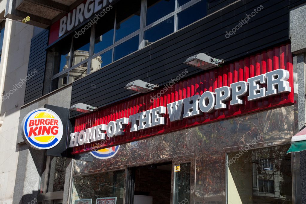 VALENCIA, SPAIN - JANUARY 28, 2014: Burger King fast food restaurant in Valencia. At the end of fiscal year 2013, Burger King reported it had over 13,000 outlets in 79 countries.