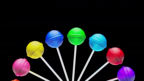 Isoliert Aufgefächerte Bunte Rotierende Lollipop Schleife Mit Alpha Kanal — Stockvideo