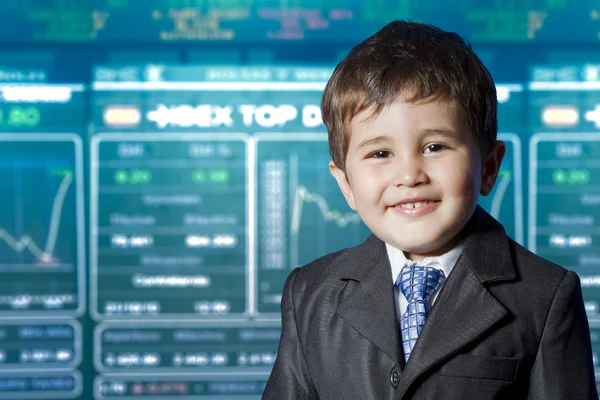 Child dressed businessman with funny face. stock market — Stock Photo, Image