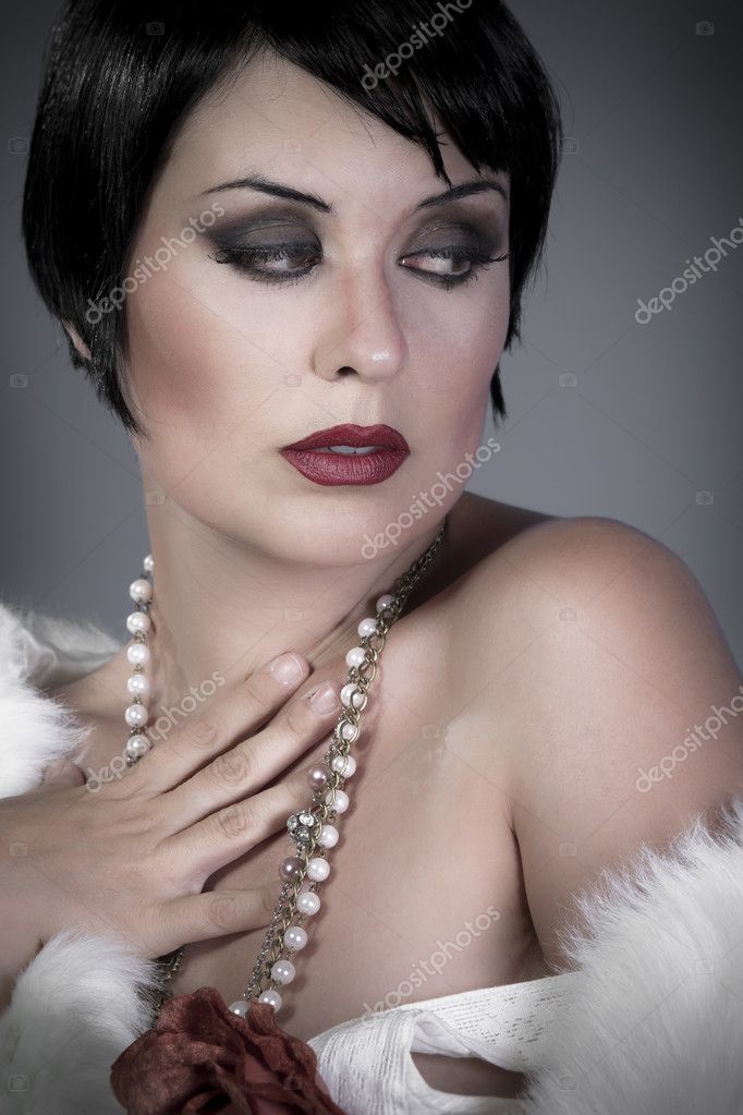 Gourgeos Flapper Wearing Pearls Gourgeos Flapper Wearing Pearls Stock Photo