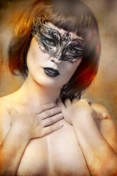 Mysterious woman with artistic style Venetian mask Royalty Free Stock Images