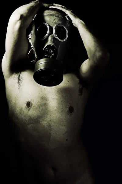 Panic, grunge portrait man in gas mask — Stock Photo, Image