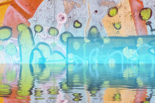 Abstract colorful graffiti reflection in the water — Stock Photo, Image