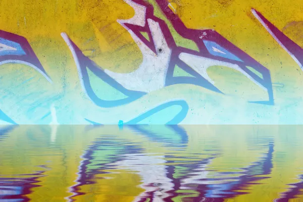 Abstract colorful graffiti reflection in the water — Stock Photo, Image