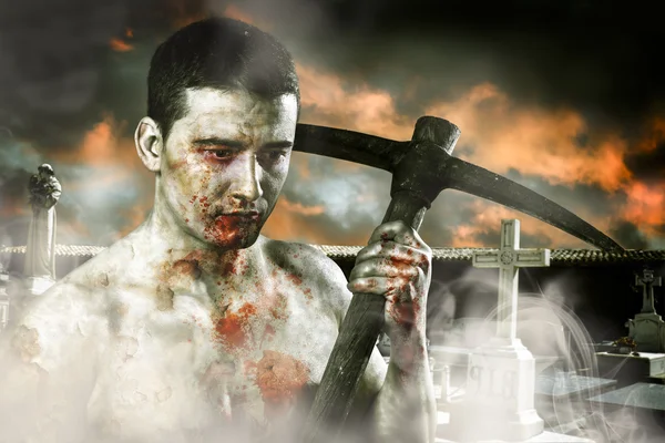 Male zombie in a cemetery, undertaker with pick axe, retro — Stock Photo, Image