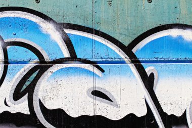 Street art, segment of an urban grafitti on wall, chrome letters clipart