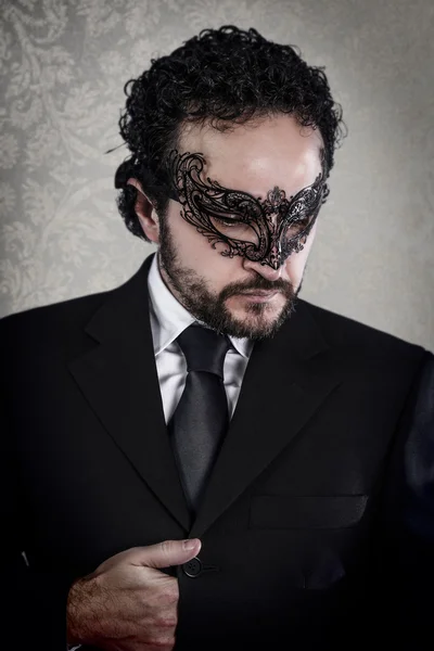 Geschäftsmann mit venezianischer Maske — Stockfoto