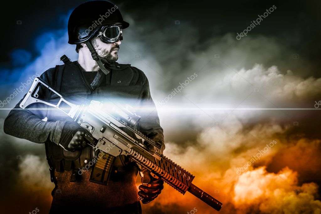 Assault soldier with rifle on apocalyptic clouds — Stock Photo