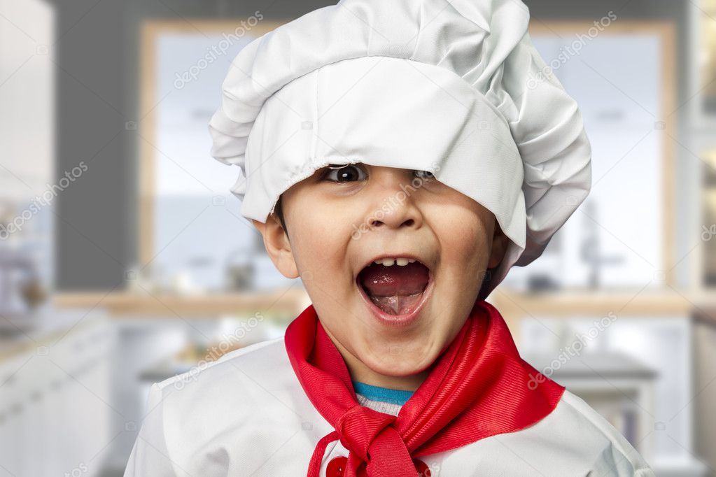 funny child dressed as a cook