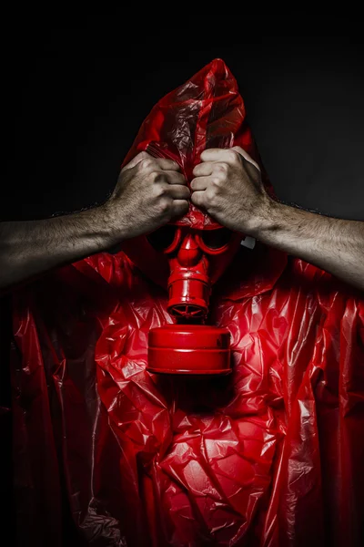 Toxic concept, man with red gas mask. — Stock Photo, Image