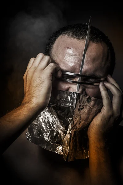 Ill, concept of fear and terror, naked man with hardware in the face — Stock Photo, Image