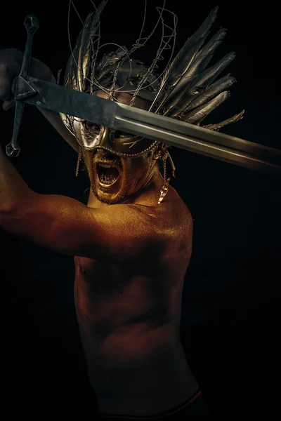 Courage, warrior or ancient god with golden mask and sword great — Stock Photo, Image