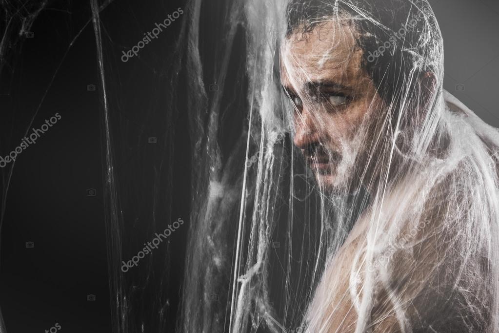 Halloween, naked man caught in spider web Stock Photo by ©outsiderzone  32578743