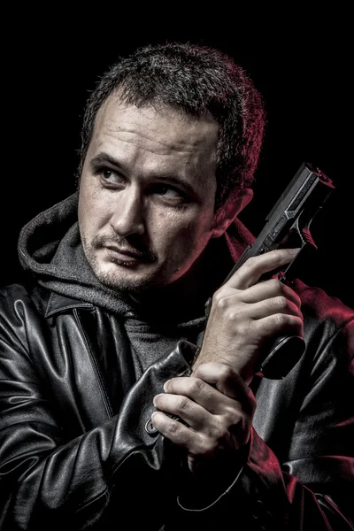 Thief, armed man with black leather jacket, dangerous — Stock Photo, Image