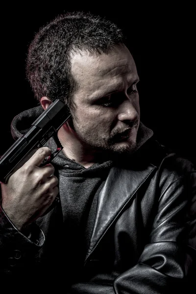 Risk, thief, armed man with black leather jacket, dangerous — Stock Photo, Image